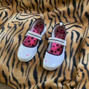 Nike slip on dress casual shoes. Vintage, vinyl type material, easy to clean.